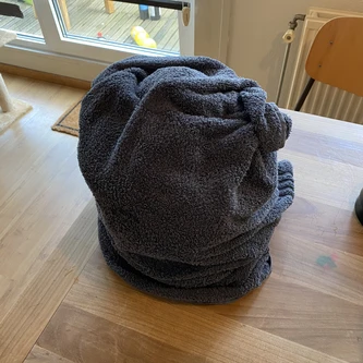 Pot wrapped in a blanket for pasteurization